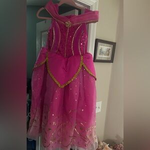 Disney store Aurora gown in great condition for Halloween, Disney or Playtime.